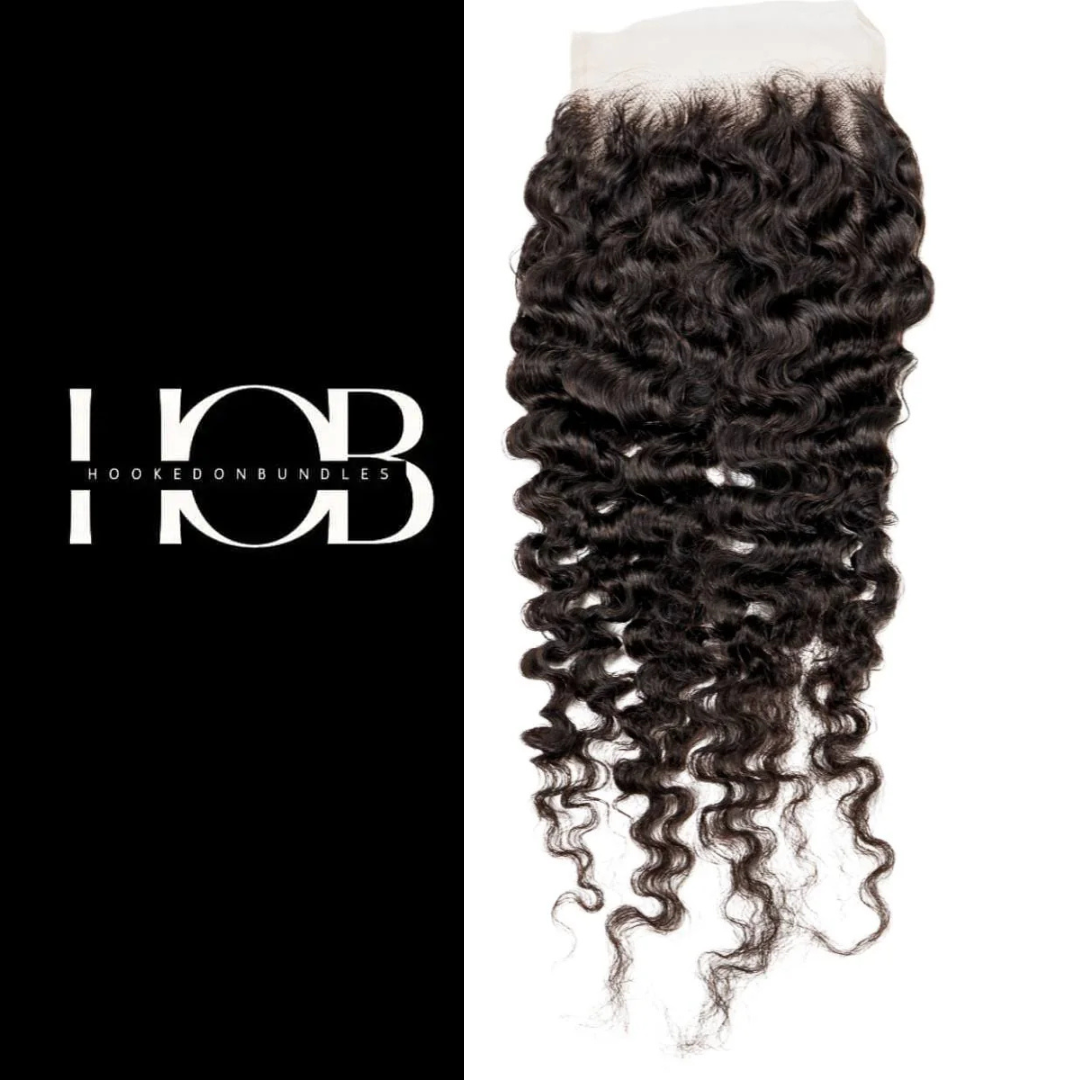 Curly hair bundle with lace closure on a white background